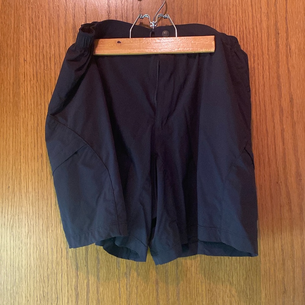 Black REI women’s stretchy hiking shorts size medium